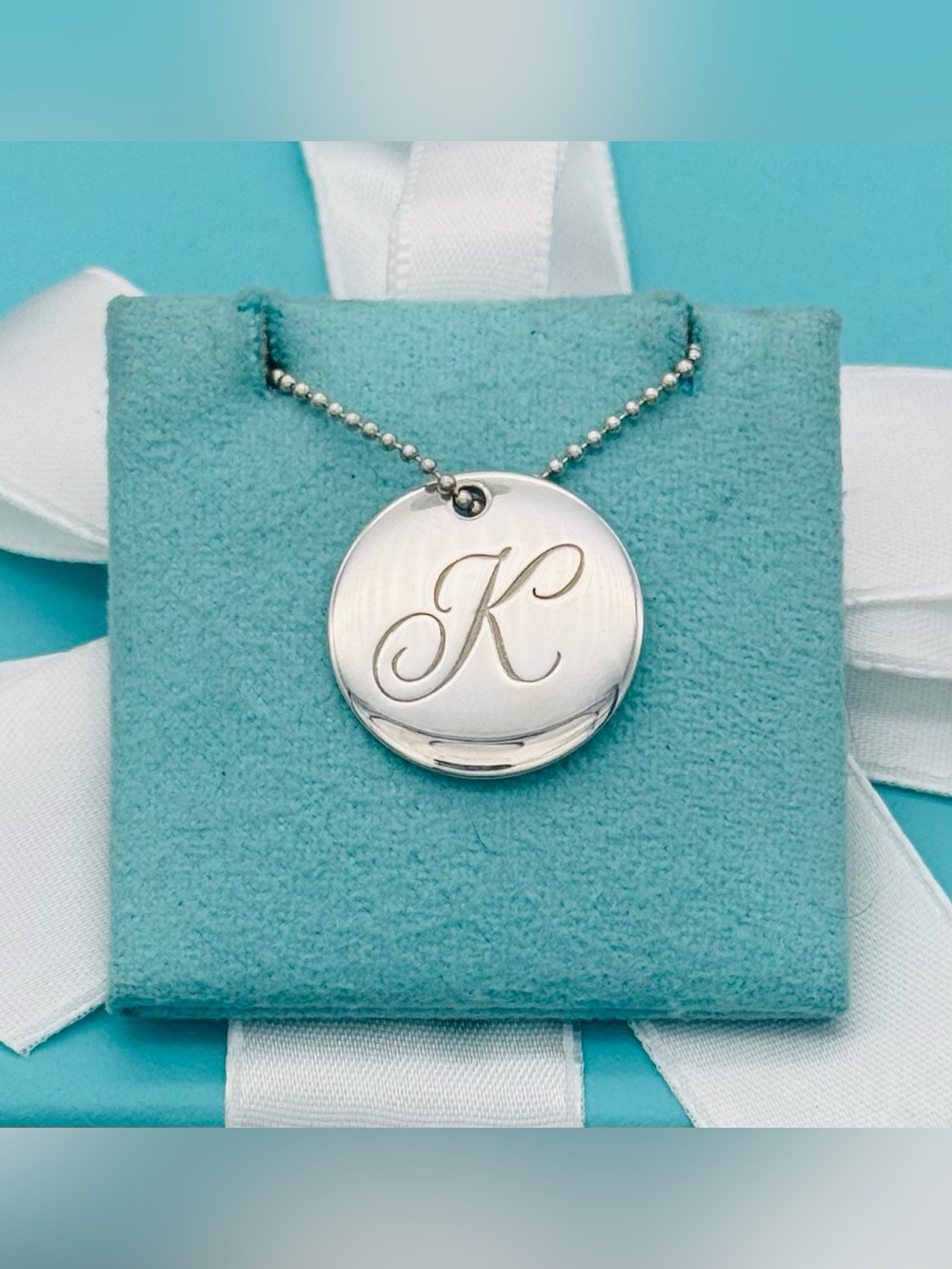 Tiffany & Co. Notes Alphabet Disc Necklace - K